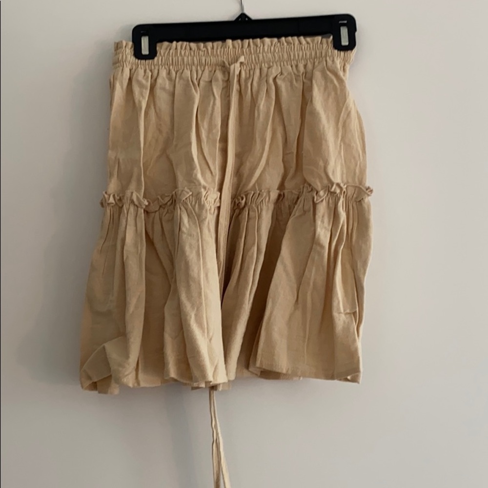 Tan mini skirt
